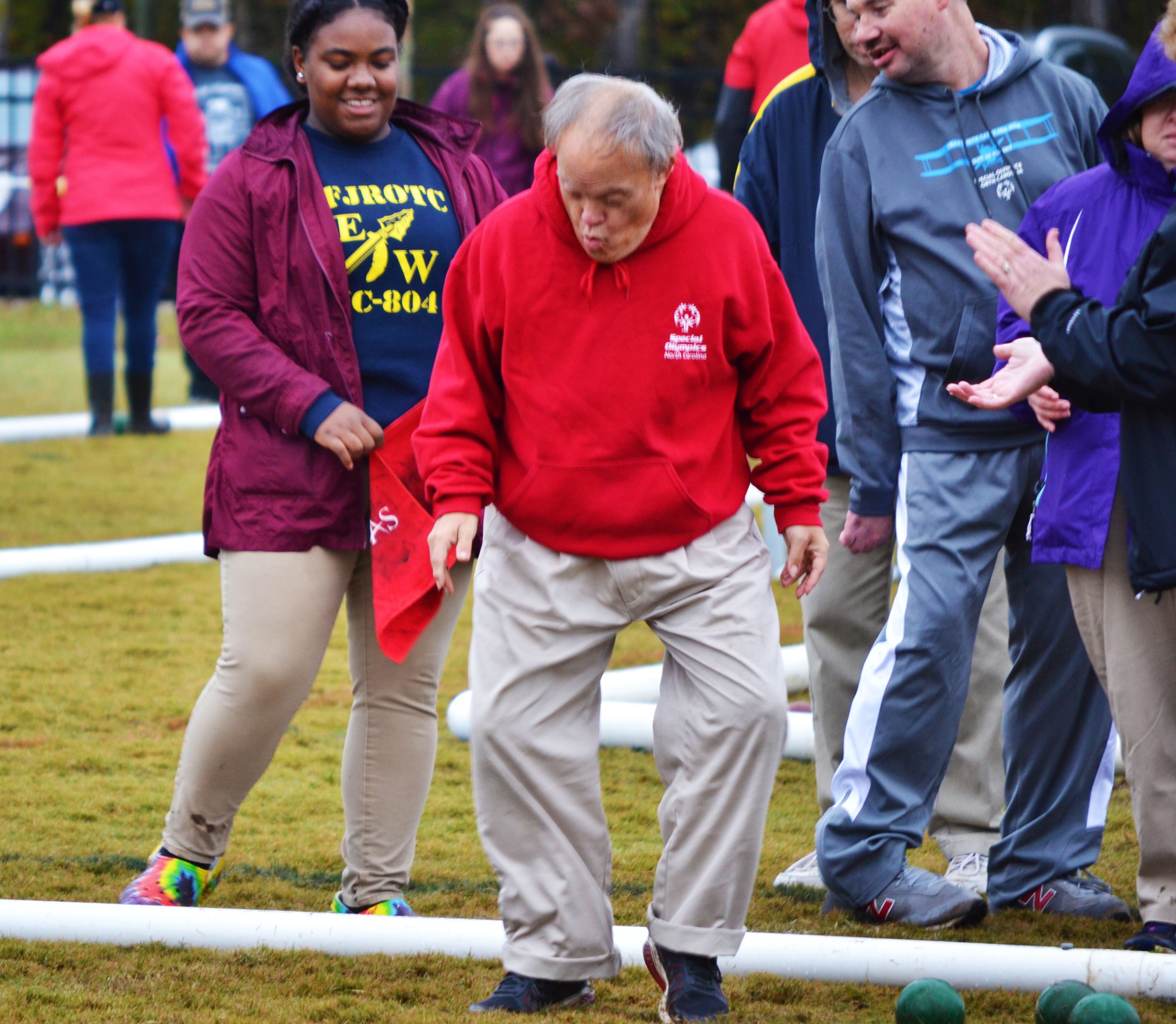 A Special Olympics athlete dances after a particularly good bowl during the bocce tournament at Ches