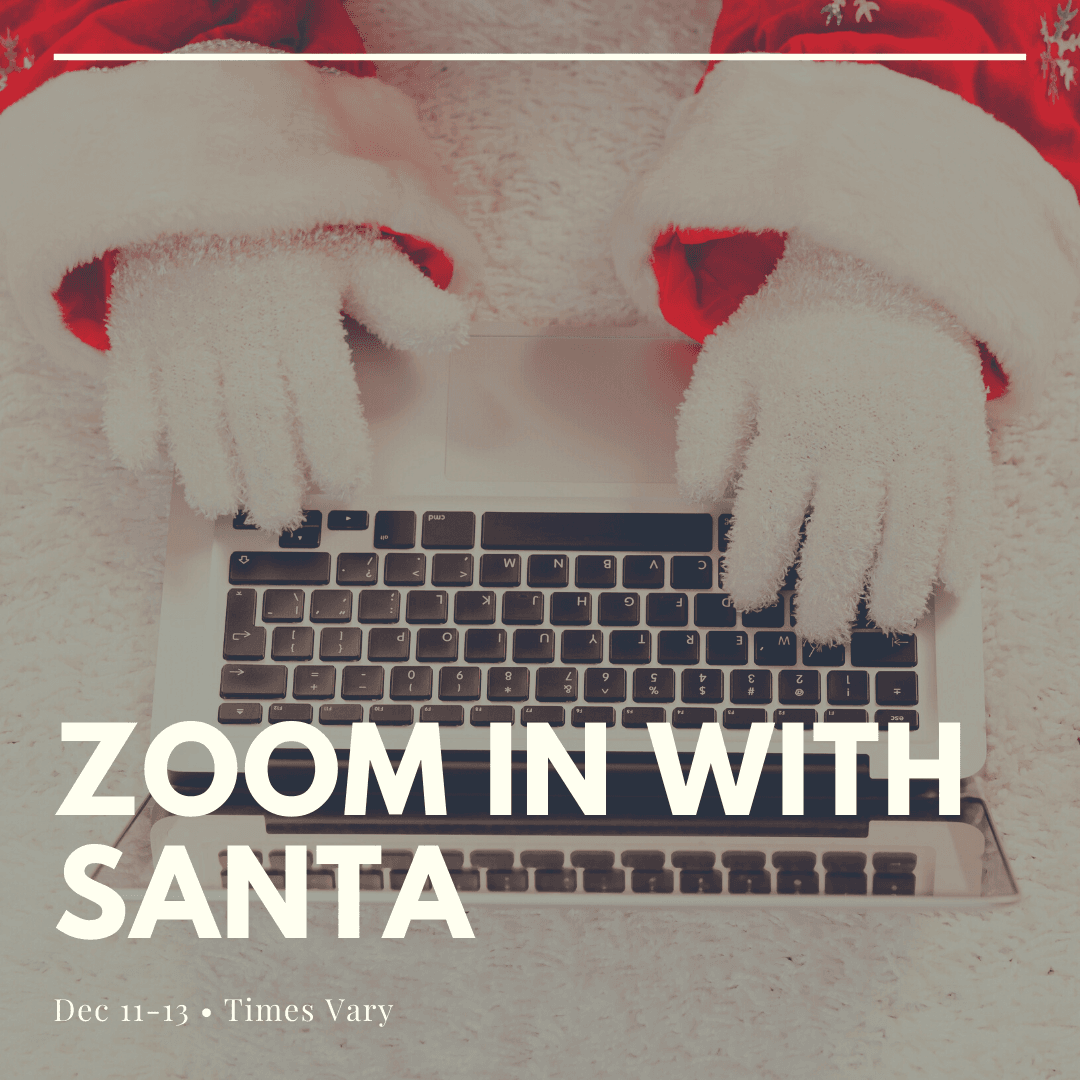 Santa Claus typing on a laptop. 